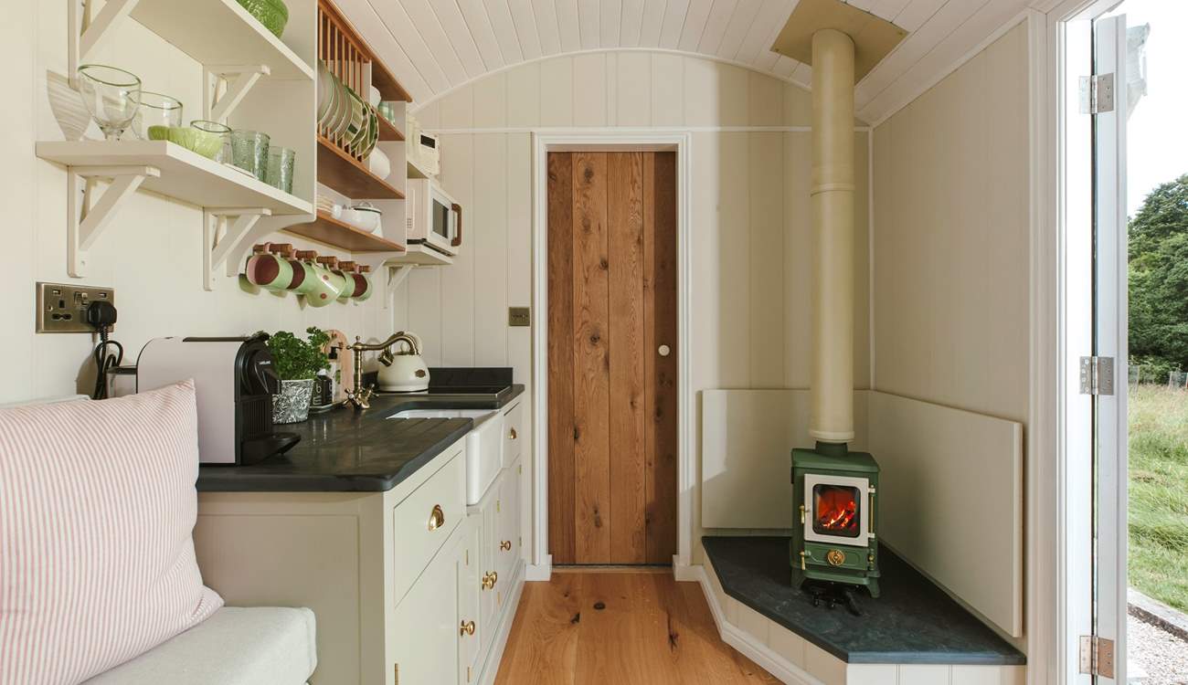 The warming wood-burner will keep you toasty throughout the seasons. 