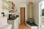 The warming wood-burner will keep you toasty throughout the seasons.