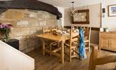 Share a meal around the farmhouse table. - Thumbnail Image