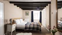 A spacious bedroom with plenty of storage.