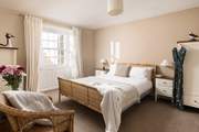 This comfy room has light flooding in.