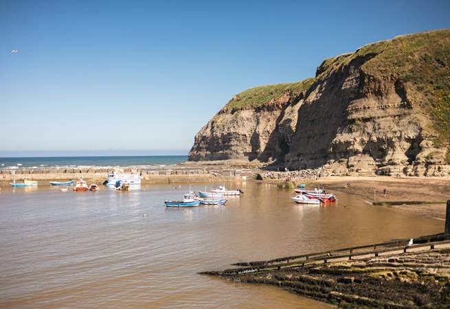 Watch the fishing boats in the harbour.