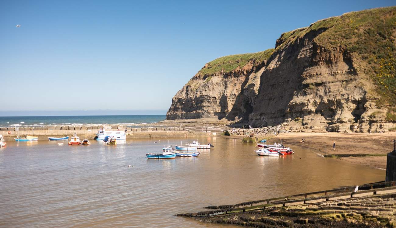 Watch the fishing boats in the harbour.