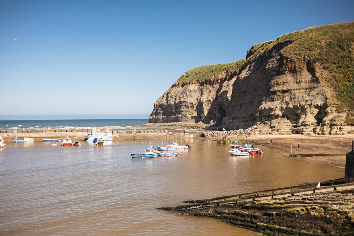 Watch the fishing boats in the harbour.