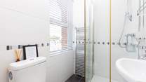 Bedroom 2 enjoys the benefit of a handy en suite shower.