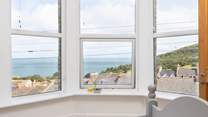 Watch the ebb and flow of the rolling sea from your ever-changing picture window. 