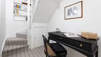 Climb the stairs to bedroom 3.