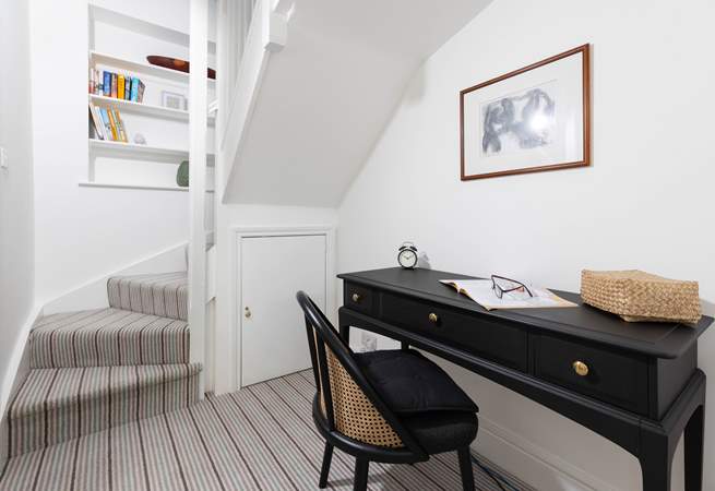 Climb the stairs to bedroom 3.