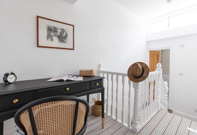 Head up to the landing from the family bathroom where you will find a handy work station outside of bedrooms 1 and 2.