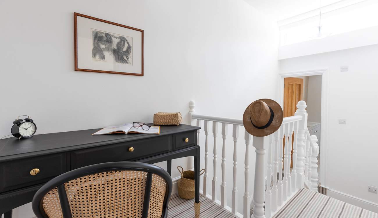 Head up to the landing from the family bathroom where you will find a handy work station outside of bedrooms 1 and 2.