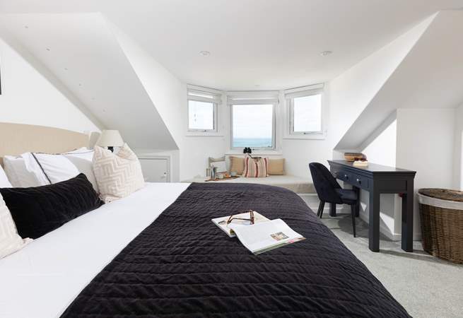 Not only do you have a perfect perch to enjoy the view but also a handy work or vanity table.