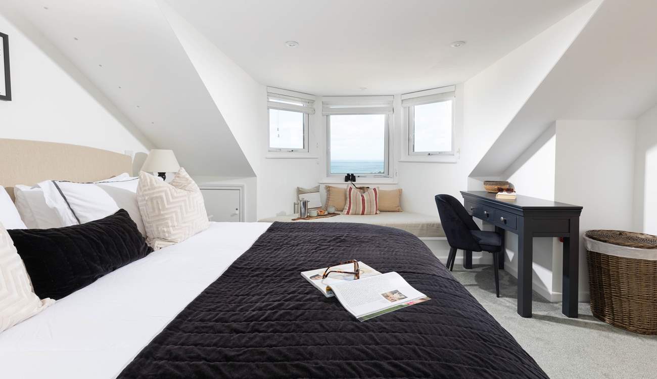 Not only do you have a perfect perch to enjoy the view but also a handy work or vanity table.