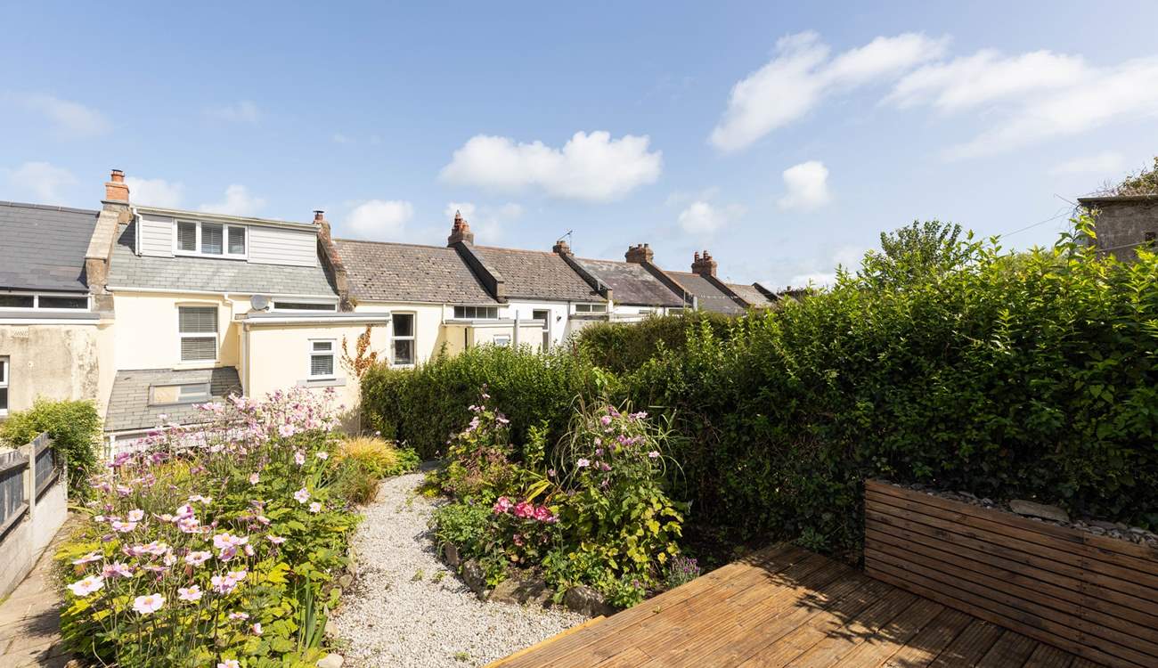 Head up to the top decking and enjoy what will be a lovely sitting area.