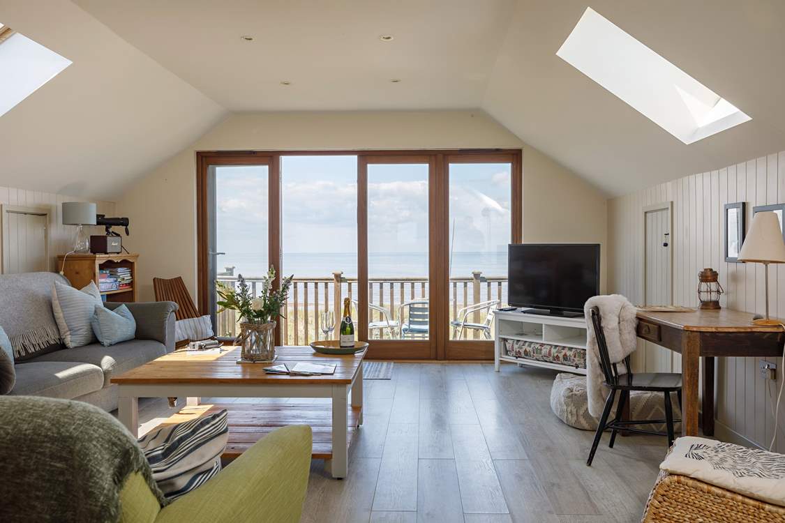 Open up the French doors and breathe in the sea air.