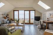 Open up the French doors and breathe in the sea air.