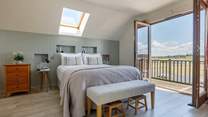 Have your morning coffee on the balcony of the main bedroom.