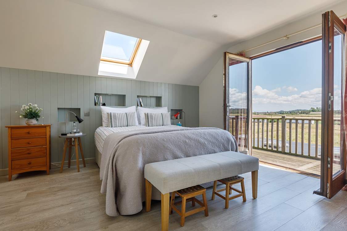 Have your morning coffee on the balcony of the main bedroom.