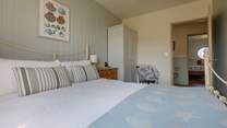 Enjoy a relaxing night's sleep in the sumptuous bed in the ground floor double bedroom.