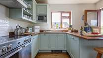 A beautiful kitchen awaits your culinary skills!