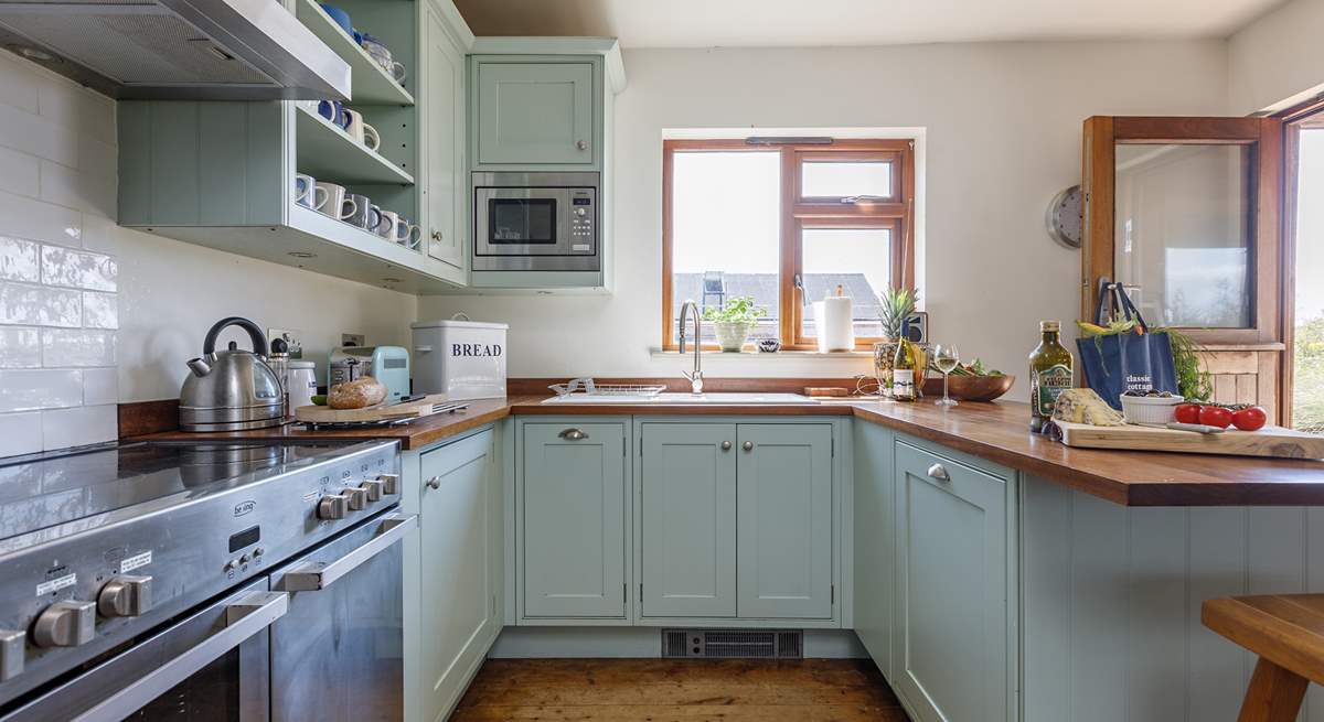 A beautiful kitchen awaits your culinary skills!