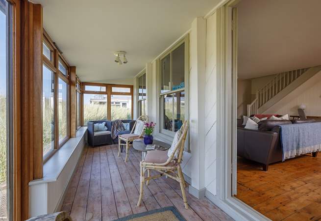 A tranquil place to enjoy a novel with the soundtrack of the sea.