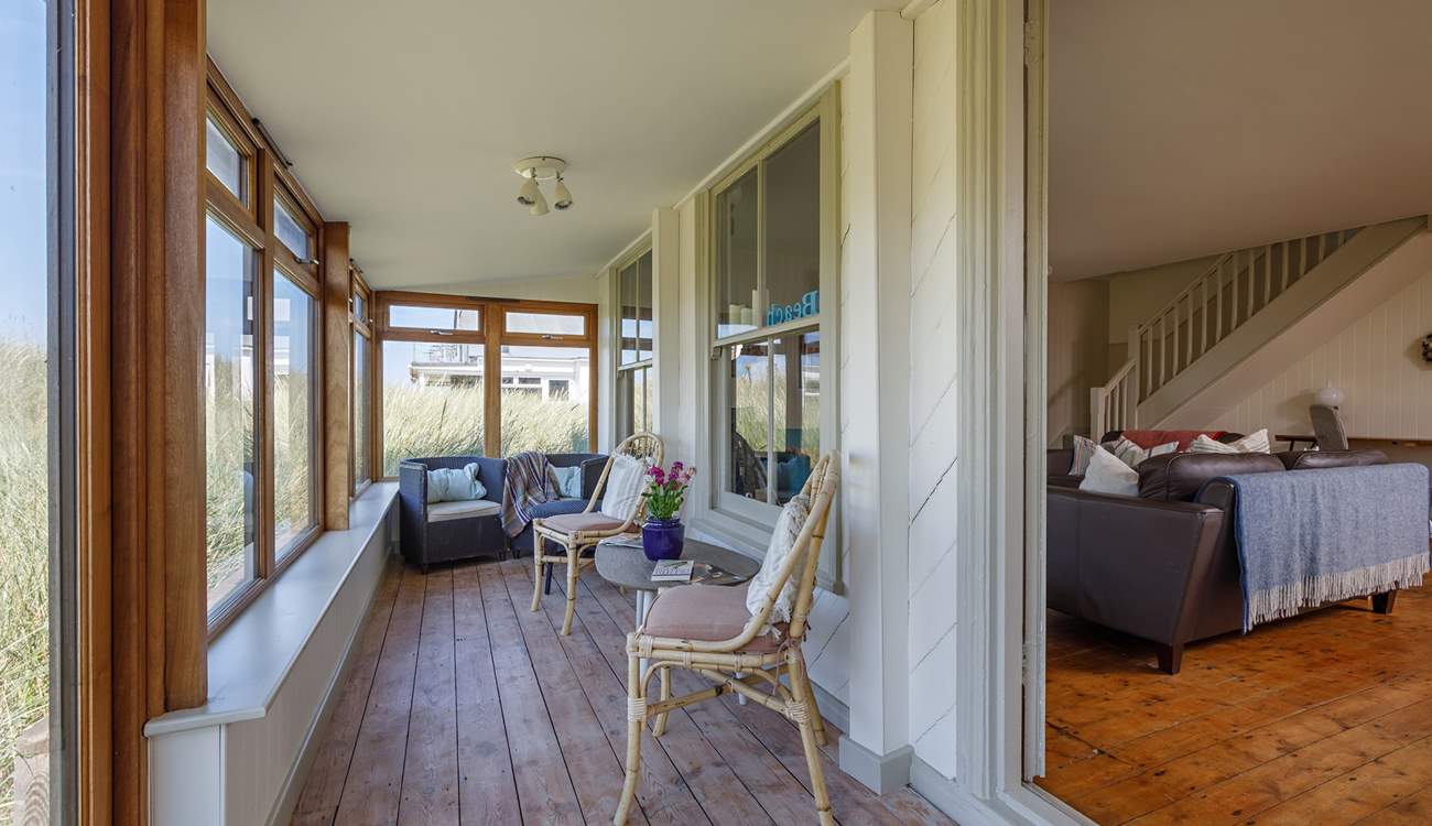 A tranquil place to enjoy a novel with the soundtrack of the sea.