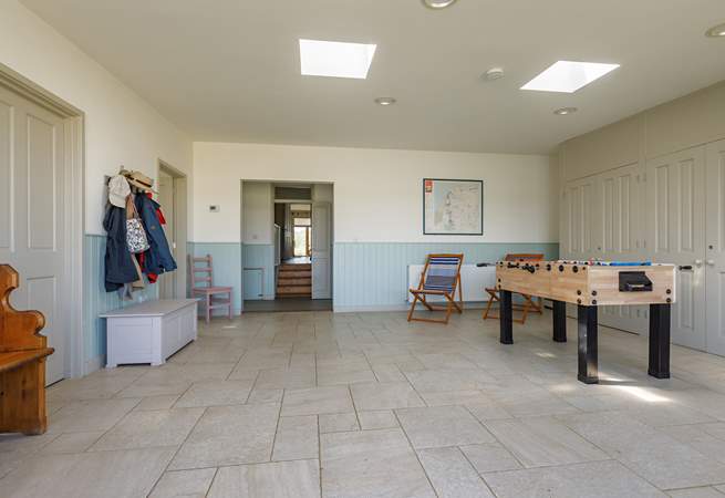 The entrance lobby/games-room has table football and a table-tennis table.
