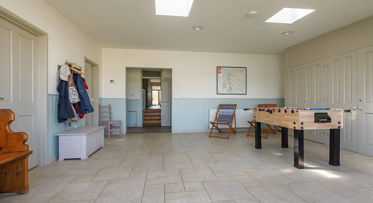 The entrance lobby/games-room has table football and a table-tennis table.