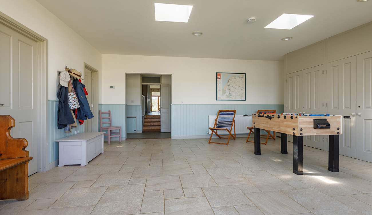 The entrance lobby/games-room has table football and a table-tennis table.