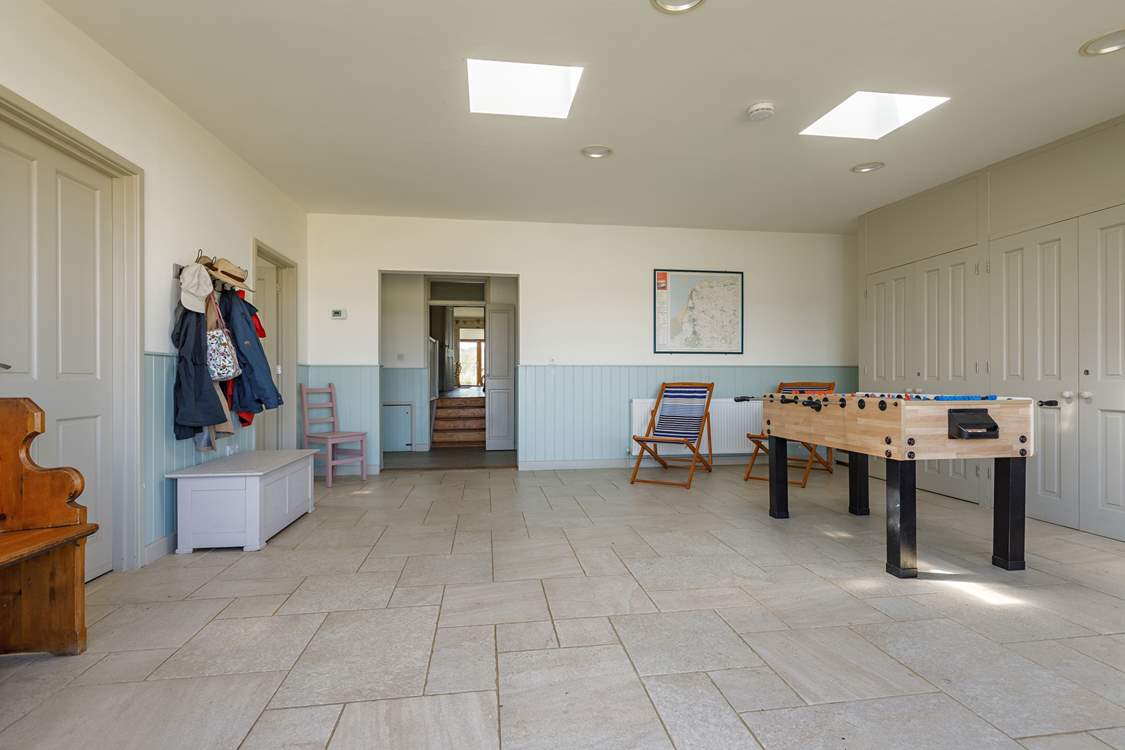 The entrance lobby/games-room has table football and a table-tennis table.