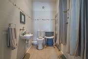 The lower ground floor wet-room has accessible shower facilities.
