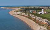 At low tide take a stroll along the promenade towards the lighthouse at 'Sunny Hunny'. - Thumbnail Image