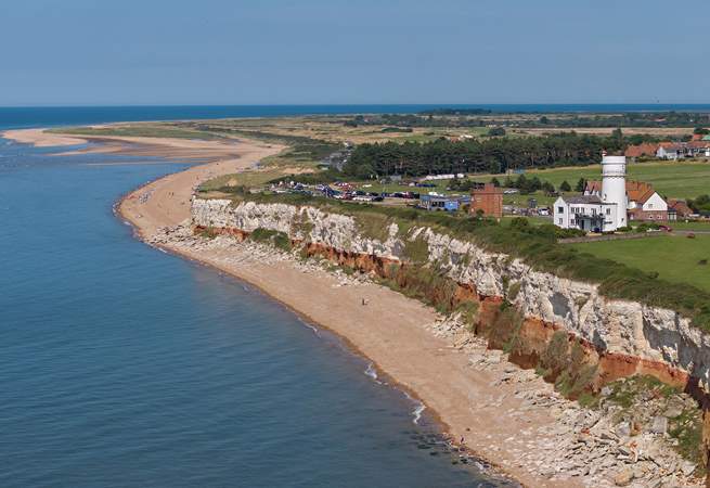 At low tide take a stroll along the promenade towards the lighthouse at 'Sunny Hunny'.