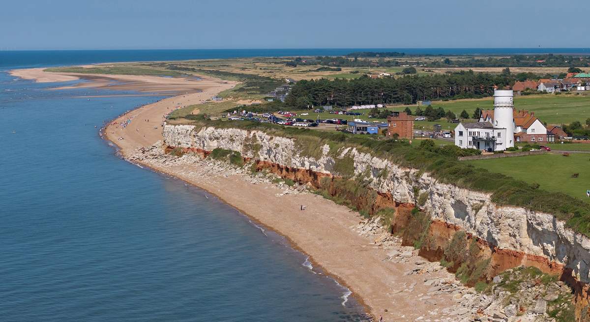 At low tide take a stroll along the promenade towards the lighthouse at 'Sunny Hunny'.