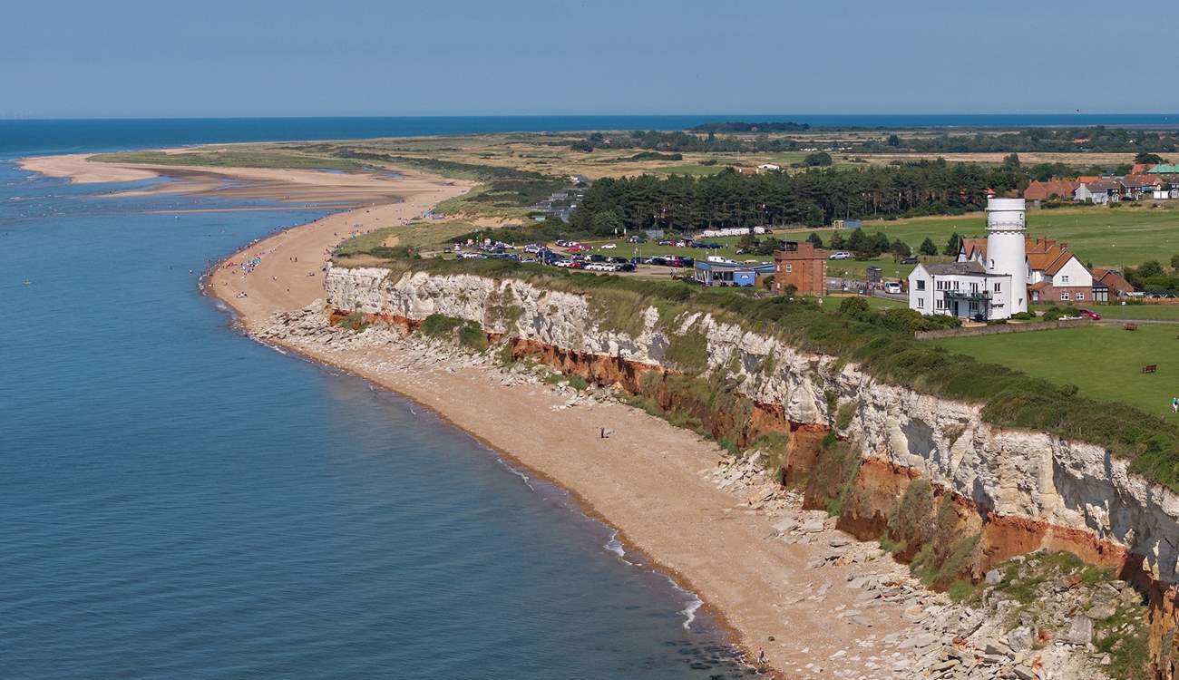 At low tide take a stroll along the promenade towards the lighthouse at 'Sunny Hunny'.