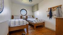 The ground floor twin bedroom is perfect for adults or children.