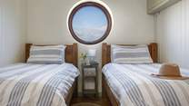 Take a peek through the round window.
