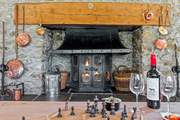 The magnificent wood-burner complements any evening.