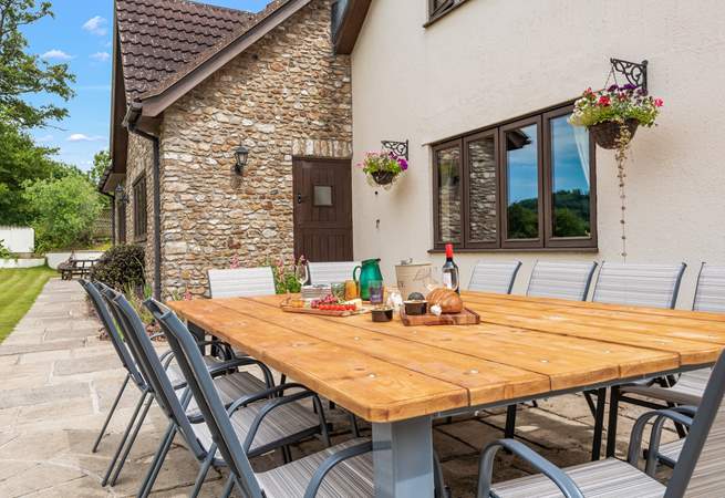 Dining al fresco at this fabulous table is a must.