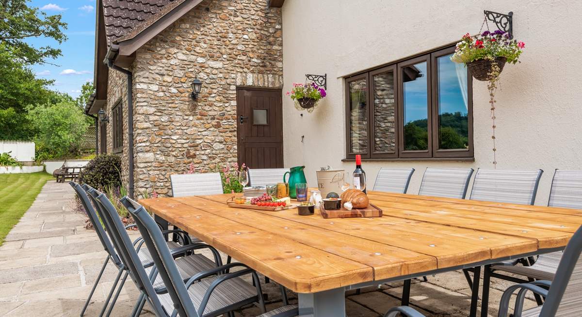 Dining al fresco at this fabulous table is a must.