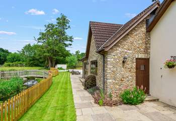 The external areas offer something for everyone. Another seating area can be enjoyed at the furthest end of the patio.
