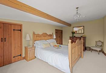 Bedroom 4 is home to this charming king-size bedroom.