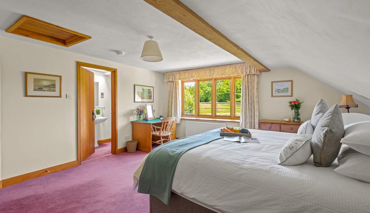 Bedroom 5 is super inviting and also offers an en suite shower-room.
