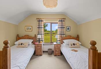 Bedroom 2 is home to this cute twin room. Boasting beautiful countryside views too.