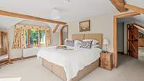 Bedroom 1 is home to this glorious super-king bed, which can also be configured as a twin room on request.