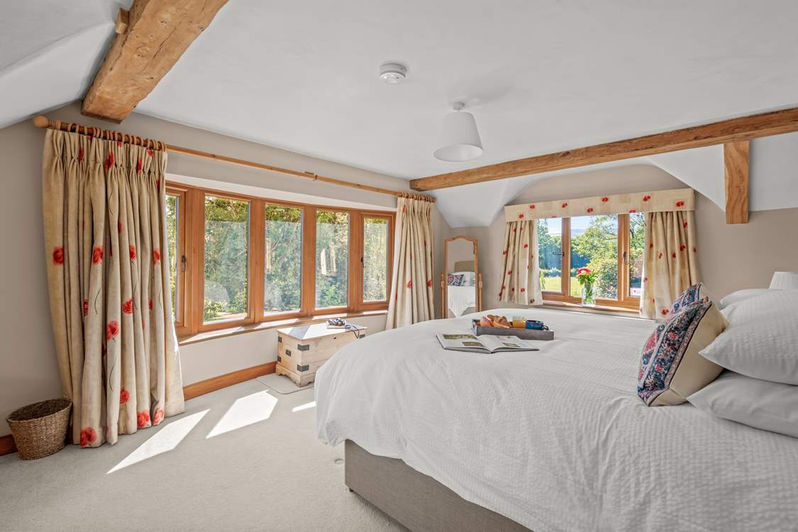 Bedroom 1 is simply gorgeous with oodles of space and magnificent views.