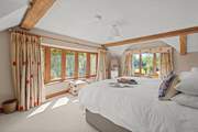 Bedroom 1 is simply gorgeous with oodles of space and magnificent views.