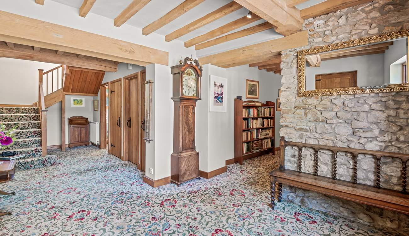 Back inside Lexhayne Mill, the stairs to the first floor bedrooms lead from the grand entrance hall.
