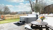 Enjoy your surroundings from the bubbling hot tub after a busy day of exploring - bliss!