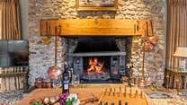 The magnificent wood-burner complements any evening.